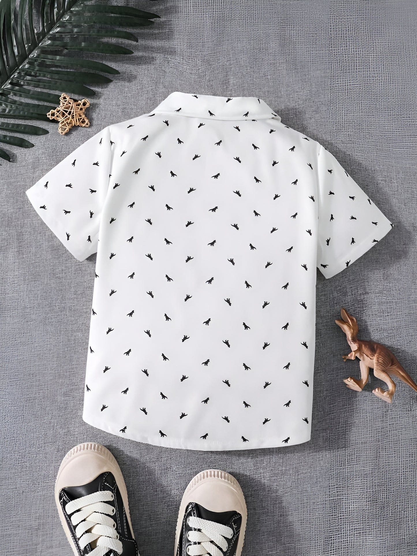 White Kids' Short-Sleeve Printed Shirt with Black Dino Patterns - Stylish & Comfortable